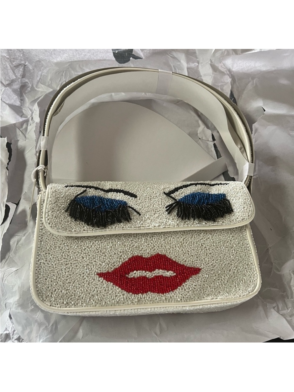 STAUD White Beaded Shoulder Bag with Blue Eyelash Detail and Red Lip Motif